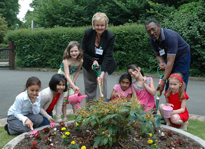 Winning pupils with their gardening prizes